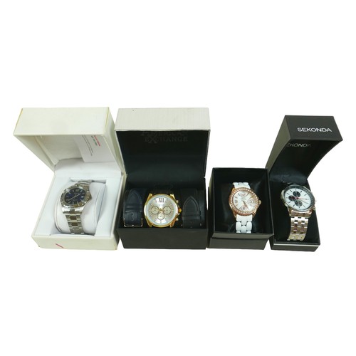 155 - A group of four 'fashion' watches, including Accurist, American Exchange and Sekonda, all boxed. (1 ... 