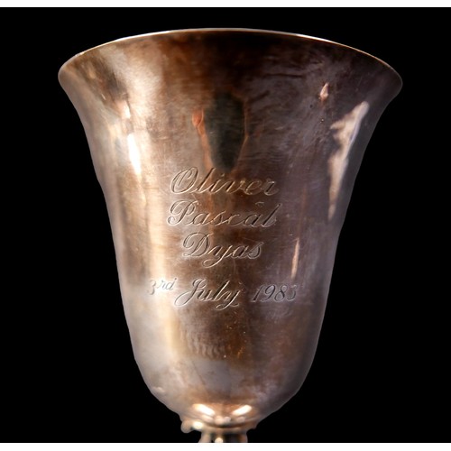 22 - A group of three silver items, including a silver goblet, engraved with 'Oliver Pascal Dyas, 3rd Jul... 