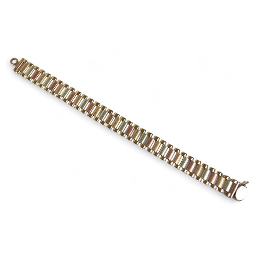 132 - A 9ct gold tri-colour bracelet, with reticulated links and oval clasp, approx. 18g, marked 375.