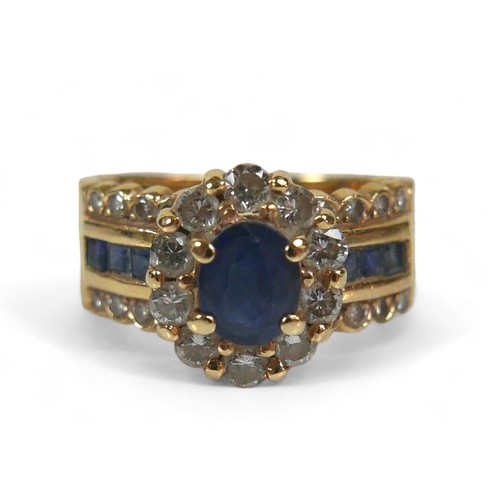 139 - A 14k gold, sapphire and diamond ring, the oval central blue sapphire surrounded by a flowerhead of ... 