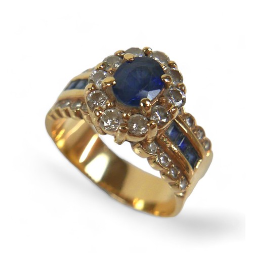 139 - A 14k gold, sapphire and diamond ring, the oval central blue sapphire surrounded by a flowerhead of ... 