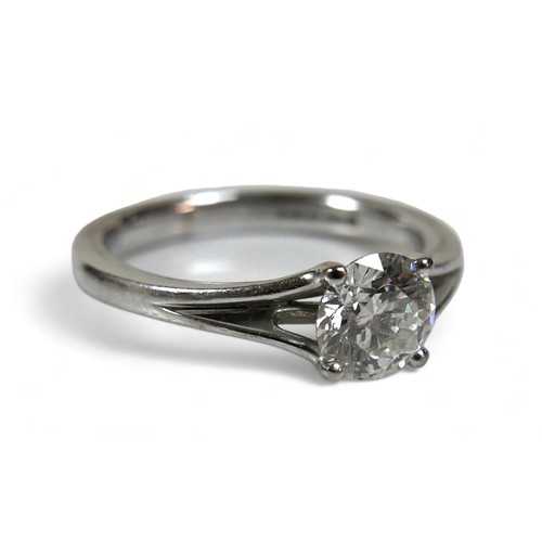 153 - An 18ct white gold Hearts On Fire diamond solitaire ring, the band with V shoulders, the brilliant c... 