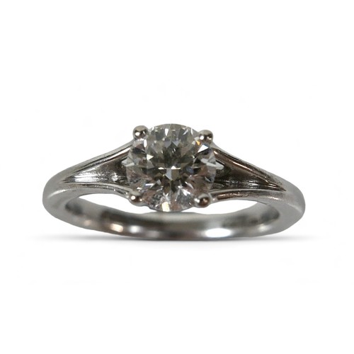 153 - An 18ct white gold Hearts On Fire diamond solitaire ring, the band with V shoulders, the brilliant c... 