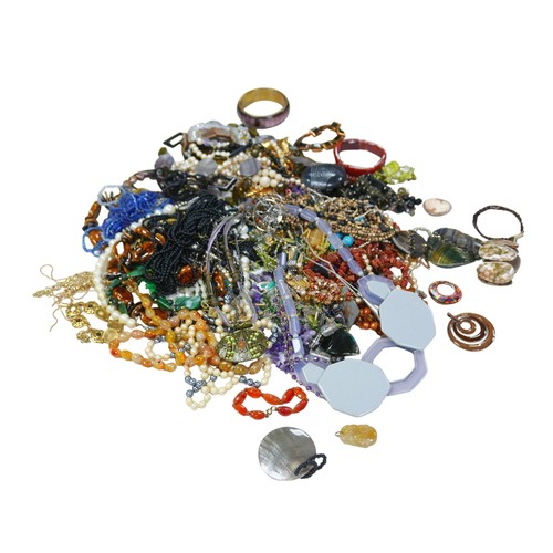 70 - A collection of vintage and retro costume jewellery, including mostly necklaces and bangles, togethe... 