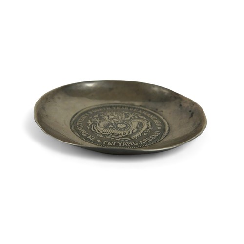 63 - A silver Chinese Pei Yang coin dish, 6.5 cm diameter by 1cm high, 39.7gs.