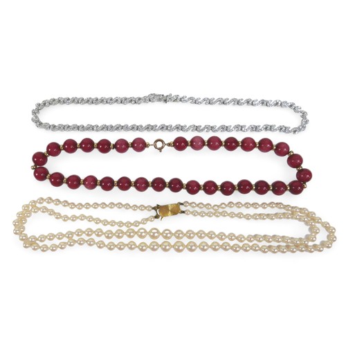 101 - A two-strand pearl necklace with 9ct gold clasp, a Heidi Kjeldsen red agate bead necklace (enhanced ... 