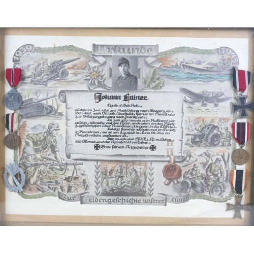 323 - A WWII German Third Reich remembrance poster, mounted with five German medals and a silver metal ass... 