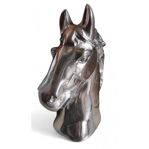 268 - A modern white metal sculpture of a horse’s head, 16 by 36 by 46cm high.