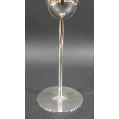 33 - A pair of Les Must de Cartier silver champagne flutes, circa 1990s, with gold, rose gold, and silver... 