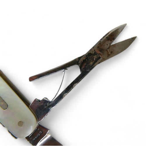 291 - A Stan Shaw four blade pen knife, with mother of pearl handle, 8cm.