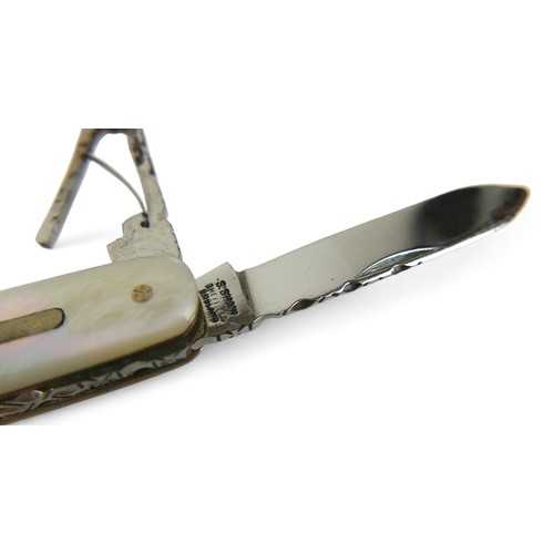 291 - A Stan Shaw four blade pen knife, with mother of pearl handle, 8cm.