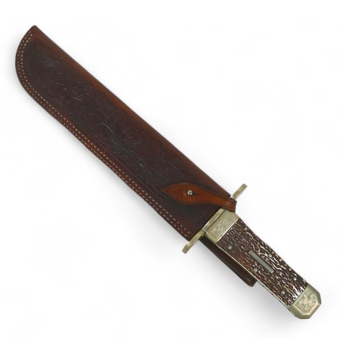 292 - A Stan Shaw hunting knife, with horn handle and fitted leather sheath, 48.5cm long.