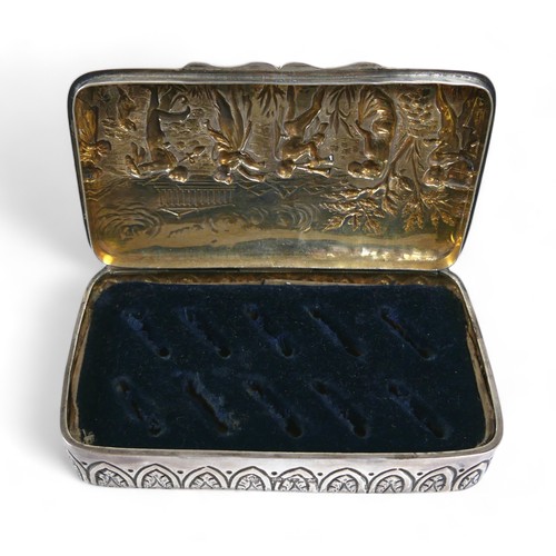 10 - A late 19th century silver ring box, with relief decoration of a mythological scene of people playin... 