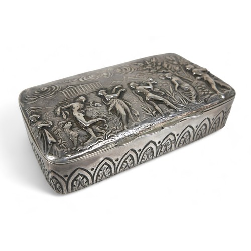 10 - A late 19th century silver ring box, with relief decoration of a mythological scene of people playin... 