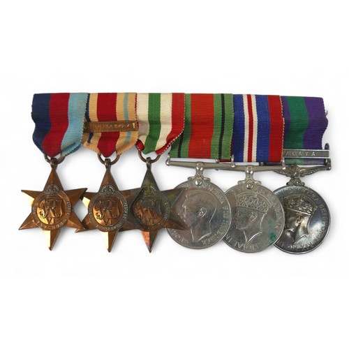 319 - A group of six WWII medals, for F. Lt W. Murphy, 52395.