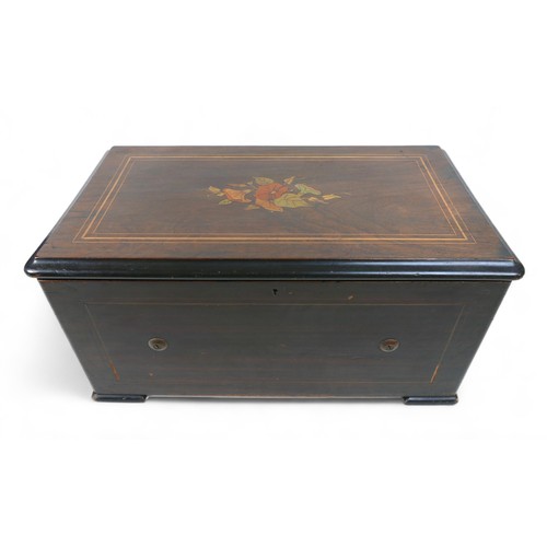 336 - A late 19th century rosewood cased music box, playing eights airs and striking on six bells and a dr... 