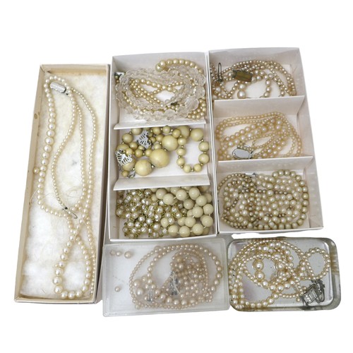 68 - A collection of costume jewellery, comprising brooches and necklaces. (1 box)