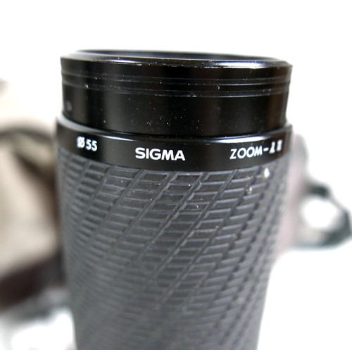 362 - A collection of cameras and lenses, including a Mamiya-Sekor Telephoto lens, CS77, F=300mm, 1:4, ser... 