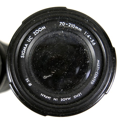 362 - A collection of cameras and lenses, including a Mamiya-Sekor Telephoto lens, CS77, F=300mm, 1:4, ser... 