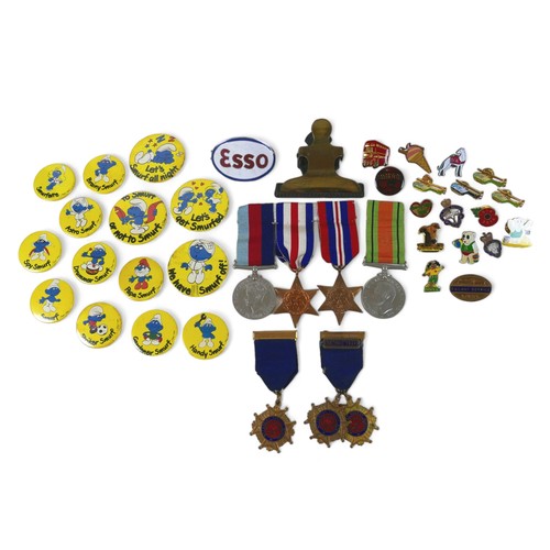 284 - A collection of badges, including an LNER Railway Service brass badge, 22 by 33mm, an enamel Esso ca... 