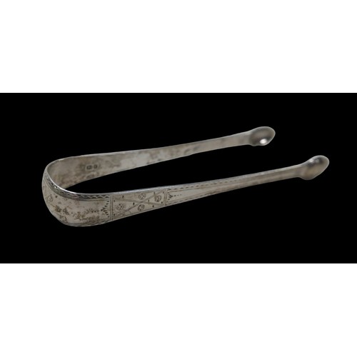 7 - A group of Georgian and later silver, comprising George III sugar tongs, London 1792, a George VI ci... 