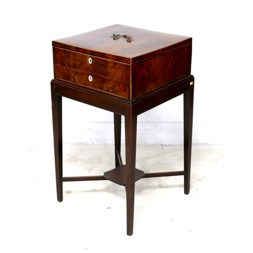 536 - A Georgian mahogany jewellery box on stand, with slender supports joined by an X stretcher, 43 by 43... 