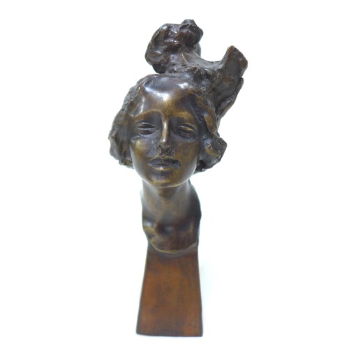 154 - Giuseppe Renda (Italian, 1859-1939): 'Head of a girl bust' (Testa di Fanciullo), a bronze sculpture,... 