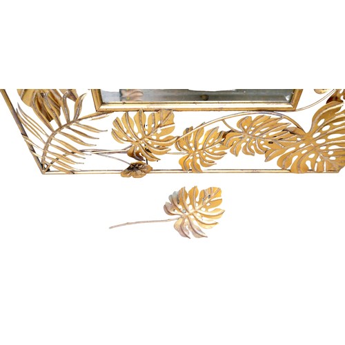 282 - A modern brass effect mirror with cheese plant leaf border, rectangular, 80 by 132cm high.