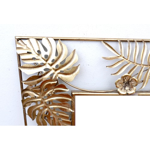 282 - A modern brass effect mirror with cheese plant leaf border, rectangular, 80 by 132cm high.