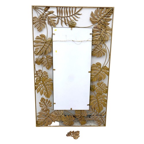 282 - A modern brass effect mirror with cheese plant leaf border, rectangular, 80 by 132cm high.