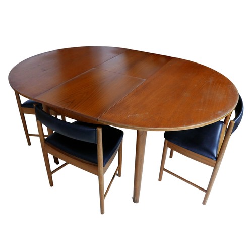 269 - An A. H. McIntosh & Co. of Kirkcaldy, Scotland, retro teak extending circular dining table, 122 by 7... 