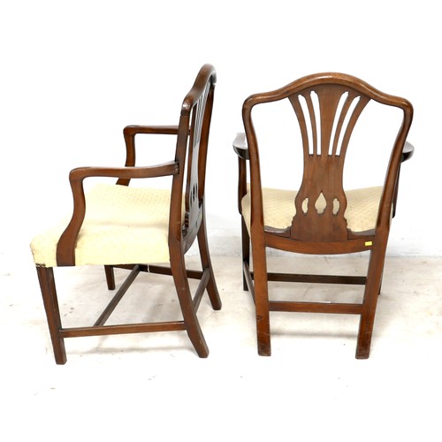 283 - A pair of Regency style mahogany carver chairs, with pierced splats, upholstered in pale cream strip... 