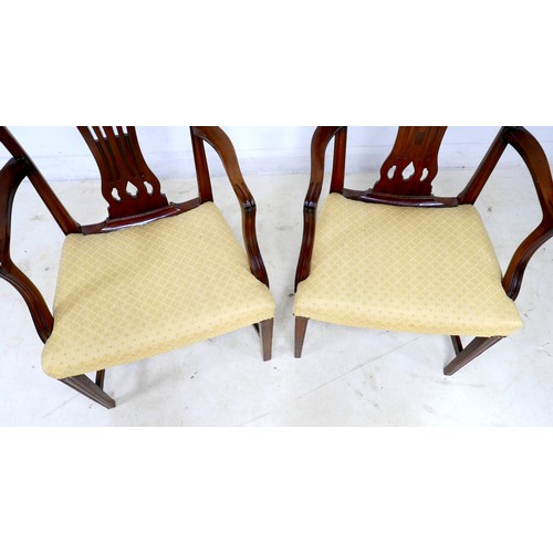 283 - A pair of Regency style mahogany carver chairs, with pierced splats, upholstered in pale cream strip... 