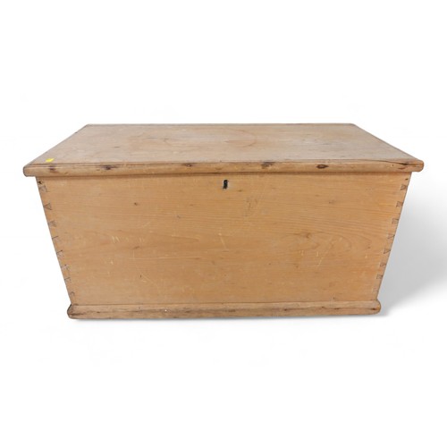 303 - A 19th century stripped pine storage box, 84 by 44 by 42cm high.