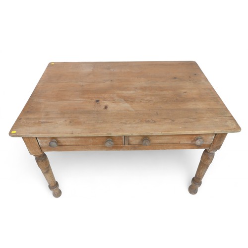 342 - A Victorian stripped pine two drawer table, on turned legs, 121 by 81 by 74cm high.