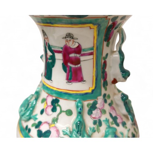 111 - A pair of Chinese Canton porcelain vases, both with drill hole lamp conversion, larger with fittings... 