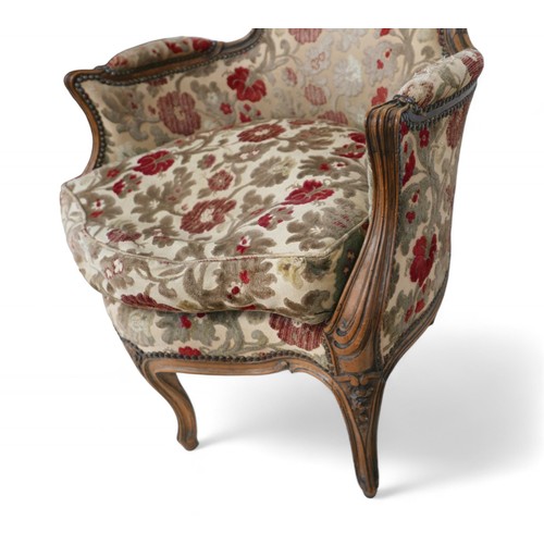 347 - An unusual 19th/20th century carved walnut upholstered easy chair on five carved and shaped legs, 67... 