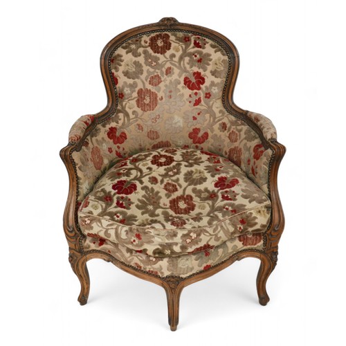 347 - An unusual 19th/20th century carved walnut upholstered easy chair on five carved and shaped legs, 67... 