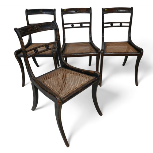 348 - A set of four regency sabre leg dining chairs, with caned seats, 47 by 47 by 83cm high.