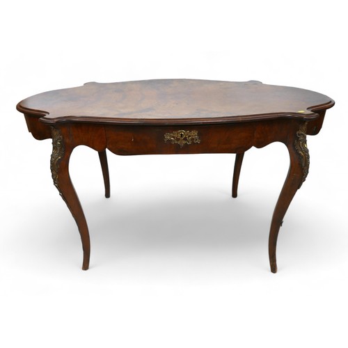 343 - A 19th century walnut bureau plat, with a shaped top and blind drawer on cabriole shaped legs having... 