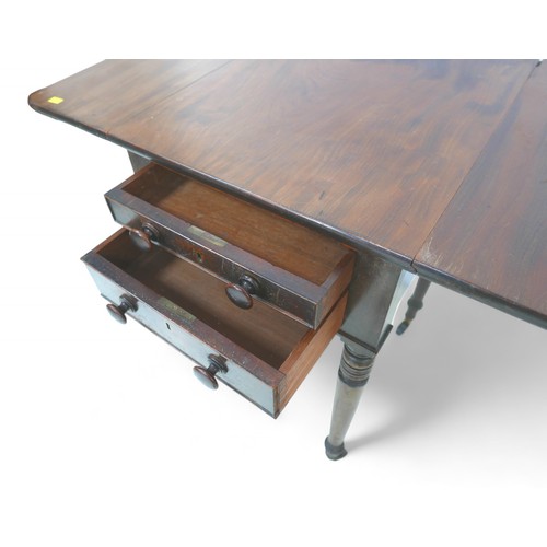 323 - A Victorian mahogany drop leaf work table, with two drawers on turned legs, 43 by 51 by 72cm high.