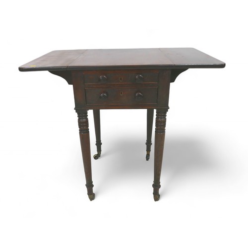 323 - A Victorian mahogany drop leaf work table, with two drawers on turned legs, 43 by 51 by 72cm high.