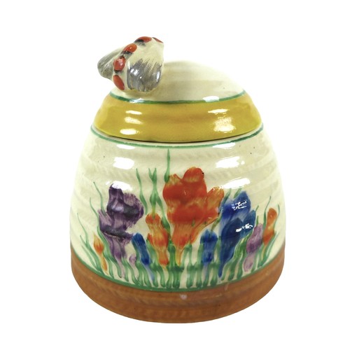 121 - A Clarice Cliff crocus pattern bee-hive preserve pot, 10cm diameter by 10cm high.