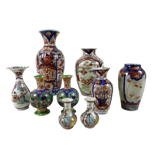 104 - A collection of oriental vases, the largest 13cm diameter by 30cm tall (9)