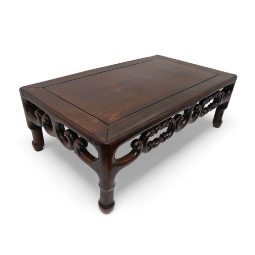 319 - A Chinese rosewood opium coffee table, early 20th century, 82.5 by 46.5 by 27.5cm high.