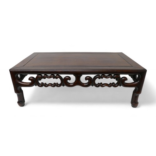 319 - A Chinese rosewood opium coffee table, early 20th century, 82.5 by 46.5 by 27.5cm high.