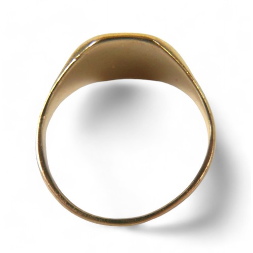 75 - A gent's 9ct gold signet ring, with star design, ring size U, head 13mm, 5.4g.