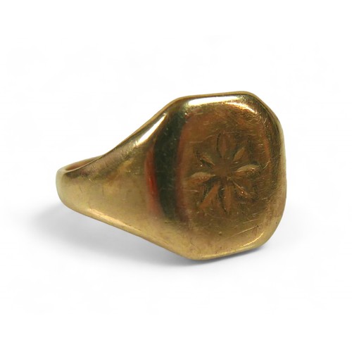 75 - A gent's 9ct gold signet ring, with star design, ring size U, head 13mm, 5.4g.