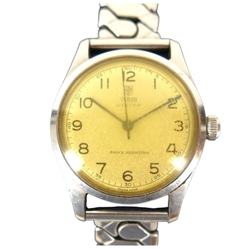 63 - A Tudor Oyster stainless steel gentleman's wristwatch, circa 1950s, the 'tropical' silvered dial wit... 