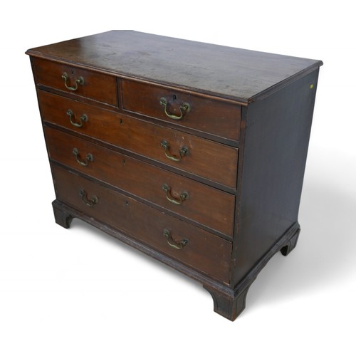 324 - A George III mahogany five drawer chest, standing on bracket feet, 108 by 57 by 90cm high.